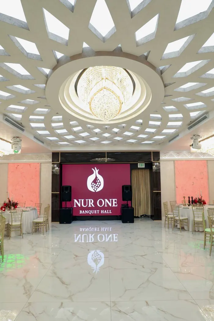 Ceiling and marble floor reflection in the Nur One ballroom